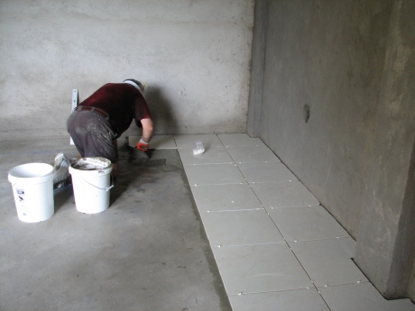 Howard laying tile